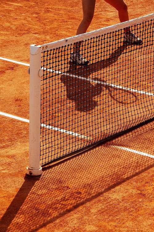 Net on a clay tennis court