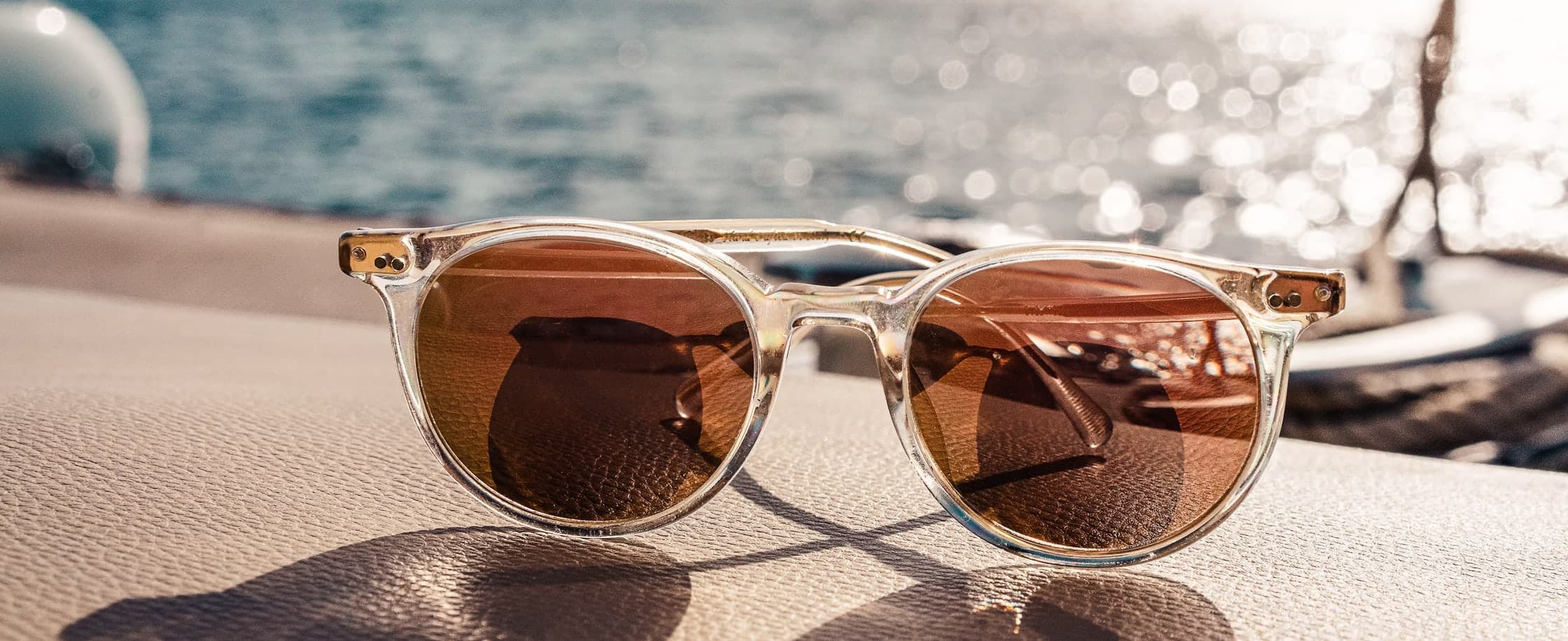 Sunglases resting on a boat surface